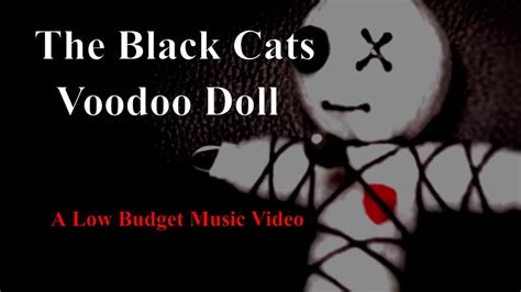 The Mystical Energies of Black Cats and Voodoo Dolls